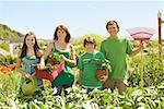 Family in in vegetable garden