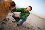 Man with Dog on Beach