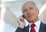 Businessman phoning with a mobile phone