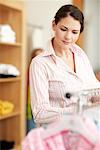 Woman Shopping in Clothing Store