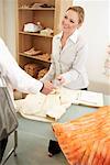 Woman Paying for Purchase in Store