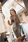 Woman looking at window display