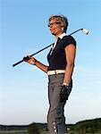 Frau mit Golf club