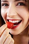 Woman Eating Strawberry