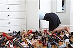 Woman Looking in Closet