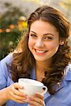 Portrait of Woman with Coffee Mug