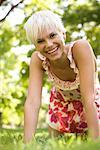 Portrait of Woman on Hands and Knees Outdoors