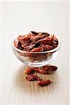 Dried chillies in a small glass dish