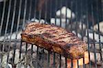 Beef steak on a barbecue