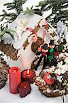 Christmas decorations and two chimney sweeps in snow