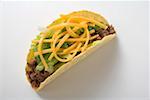 Taco with mince, lettuce and cheese (overhead view)