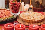 Two apple tarts on Christmassy table