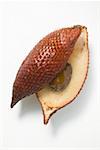 Salak fruit, halved