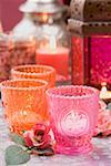 Middle Eastern decorations: windlights, roses, lantern, candles