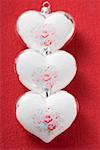 Drei silberne Herzen mit rosa Motive (Weihnachtsbaum Ornamente)