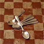 Antique Spoons on Checkerboard