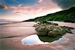 Tidal Pool and Boulder on Beach at Sunset, St Cyrus National Nature Reserve, Montrose Bay, Scotland