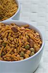 Close-up of two bowls of snacks