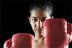 Portrait of a female boxer in boxing stance