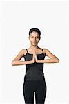 Portrait of a young woman practicing yoga