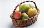 Mangoes in a wicker basket