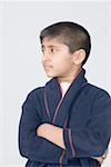 Boy wearing a bathrobe