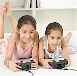 Two girls playing video game