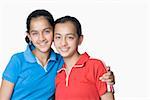 Portrait of a teenage girl smiling with her sister