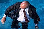 Businessman in Swimming Pool