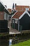 Alleyway and Ditch by Traditional Houses, Marken, North Holland, Netherlands