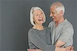 Laughing senior couple