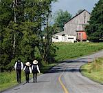 Amish Kids Walking Down Country Road, Rebersburg, Pennsylvania, USA