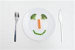 A smiley face of vegetables