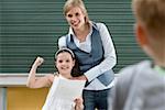 Teacher and girl in class