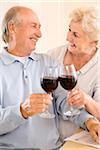 Couple Toasting with Red Wine