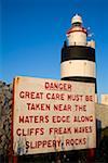 Hook Head, County Wexford, Ireland; Lighthouse with warning sign