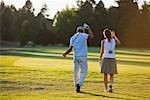 Couple Playing Golf, Salem, Oregon, USA