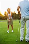 Couple Playing Golf, Salem, Oregon, USA