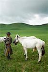 Man With Horses at the Naadam Festival Horse Race, Xiwuzhumuqinqi, Inner Mongolia, China