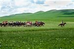 Course de chevaux du Naadam Festival près de Xiwuzhumuqinqi, la Mongolie intérieure, Chine