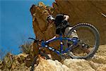 Low angle view of a mid adult man mountain biking