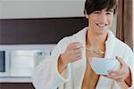 Close-up of a young man having food with a spoon