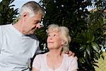 Senior man with his arm around a senior woman