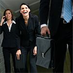 Business executives walking in a subway