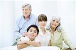 Woman with senior parents and preteen son, portrait