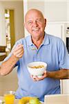 Portrait of Man Eating Cereal