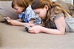 Girl and boy playing video games