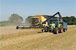 Combine harvester with tractor