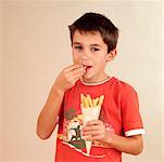 Child eating pastry sticks