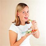 Child eating vegetable dip